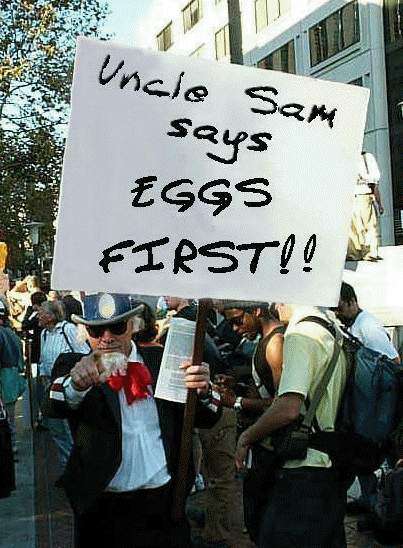 Photo: Eggs First! Protester
